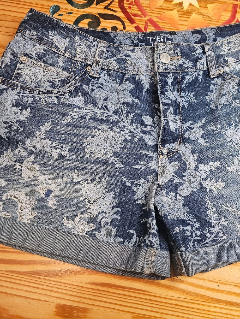 Time and Tru Blue Floral Denim Roll-Hem Shorts